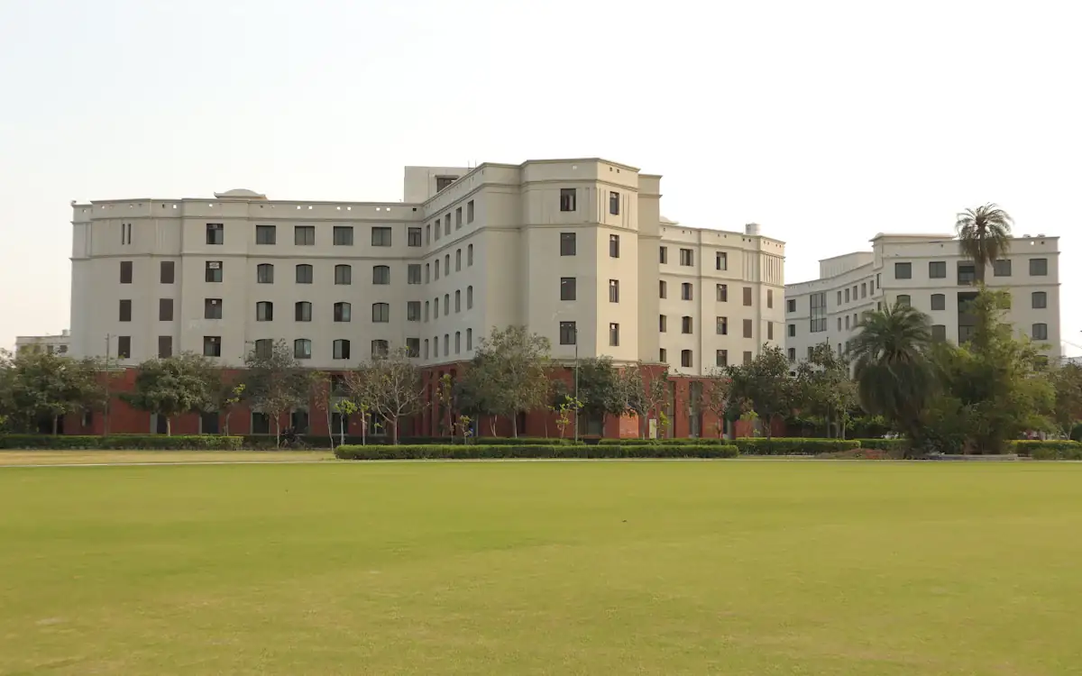 A university building across a lawn